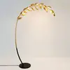 Image de Holländer Lampe sur pied Riso, à 11 lampes, dorée