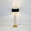 Image de Holländer Lampe sur pied Elba ovale, or/noir, hauteur 180 cm, fer