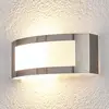 Image de Lindby applique d'extérieur Raja, 25 cm de large, acier inoxydable, IP44, E27