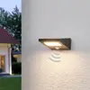 Image de Lucande Applique d’extérieur solaire Felin, écl. vs le bas