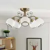 Image de Lindby plafonnier Corentin, 5 lampes, blanc/laiton, verre