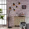 Image de Lindby lampadaire Lira, 5 lampes, hauteur 205 cm, noir, or