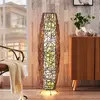 Image de Lindby lampe sur pied Nias, hauteur 111 cm, rotin, textile