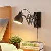 Image de Lindby Applique murale Merle, noir, 60 cm, lampe de lecture, extensible