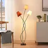 Image de Lindby lampe sur pied Melis, 130 cm, à 3 lampes, textile
