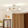 Image de Lindby Spot en bois LED Christoph, à 3 lampes, long