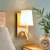 Image de Lindby, applique murale Aiden, 30 cm, laiton vieilli, lampe de lecture LED