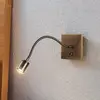 Image de Applique murale LED Lindby Mayar, laiton, métal, lampe de lecture, 11cm