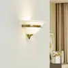 Image de Lindby applique murale Irimia, 31 cm, laiton vieilli, verre