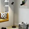 Image de Lindby Lampe sur pied Karoli, noir, 156 cm, métal, bras flexible