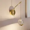 Image de Lucande applique murale LED Hayley, or, verre, hauteur 34 cm