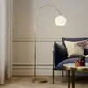 Image de Lindby lampadaire arqué Cynthia, couleur laiton, verre, 140 cm, E27