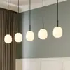 Image de Lindby Etiena suspension à 5 lampes, verre opale