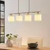 Image de Lindby suspension Stannis, 75 cm, blanc, 4 lampes, textile
