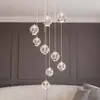 Image de Suspension LED Lucande Hayley, Ø 40 cm, à 9 lampes, chrome, verre