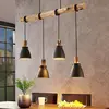 Image de Lindby suspension Trebale, E14, Ø 15 cm, 4 lampes, bois