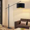 Image de Arcchio lampe à arc Mossa, 200 cm, noir-or, textile