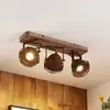 Image de Lindby spot pour plafond Farovi, rouille, 45 cm, 3 lampes, bois, GU10
