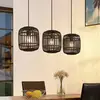 Image de Lindby suspension Canyana, noir, 3 lampes, rotin, 105 cm