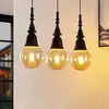 Image de Lucande Gesja suspension 3 lampes allongée noire