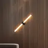 Image de Applique murale LED Maytoni Axis, doré, hauteur 63 cm