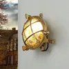 Image de Applique murale extérieure en laiton verre IP44 terrasse jardin Ø14 cm ronde G9 lampe de bateau maritime SERIFOS