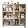 Image de Loberon Stoneham Commode avec portes en verre aspect fenêtre à barreaux, trois compartiments intérieurs, design rustique rural, rangement, commode en bois de manguier, laiton, marron