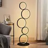 Image de Lindby, lampe sur pied LED Jacek, noir, métal, 110 cm, anneaux