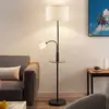 Image de Lindby Lampadaire Aovan, noir, tablette, port USB