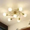 Image de Lindby plafonnier Ciala, à 7 lampes, couleur laiton, verre