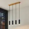 Image de Lindby suspension Maniva. 60 cm, à 4 lampes, noir, GU10