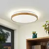 Image de Lindby Plafonnier LED Emiva, Ø 49 cm, CCT, bois
