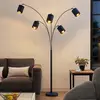 Image de Lampe sur pied Lindby Abiram, noir/or, textile, 70 cm