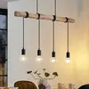 Image de Lindby suspension Ferris, 4 lampes, 90cm, bois, E27