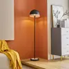 Image de Lindby Lonnaris lampe sur pied avec rotin, noire