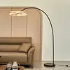 Image de Lucande, lampadaire arqué à LED Yekta, couleur laiton, 183 cm, à intensité