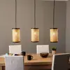 Image de Lindby suspension Yaelle, 92 cm de long, 3 lampes, rotin, E27