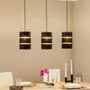 Image de Lindby suspension Tsomo, 950 cm, 3 lampes, noir, tissu