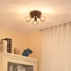 Image de Lindby Hedvig plafonnier, rond, noir, à 3 lampes