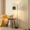 Image de Lindby Hinay lampe sur pied en tissu noir/doré