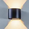 Image de Lindby, applique murale d'extérieur à LED Nivar, ronde, noire, IP54