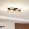 Image de Lindby plafonnier Enrique, ambre, 3 lampes, verre, bois, E27