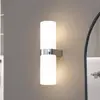 Image de Lucande applique pour salle de bain Basolo, chrome, hauteur 31,5cm, verre, IP44