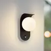 Image de Applique d'extérieur LED Lindby Lacie, capteur, noir/blanc, aluminium