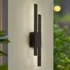 Image de Applique murale d'extérieur LED Lindby Sakari, noir, aluminium, hauteur 59 cm