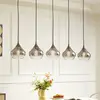 Image de Lucande, suspension Jarven, à 5 lampes, noir, verre