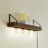 Image de Lindby Applique murale Vatana, bois, prise, port USB, 80 cm