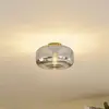 Image de Lindby Plafonnier Hildur, Ø 28,5 cm, gris fumé, verre