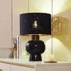 Image de Lindby lampe à poser Arved, noir, textile, céramique, 46 cm