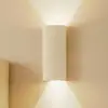 Image de Applique murale Lindby Colja, ronde, hauteur 30,5 cm, plâtre, beige